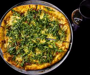 pizza with fresh arugula